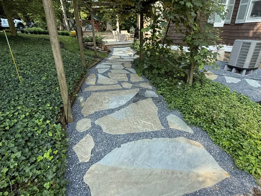 Flagstone path under the arbor