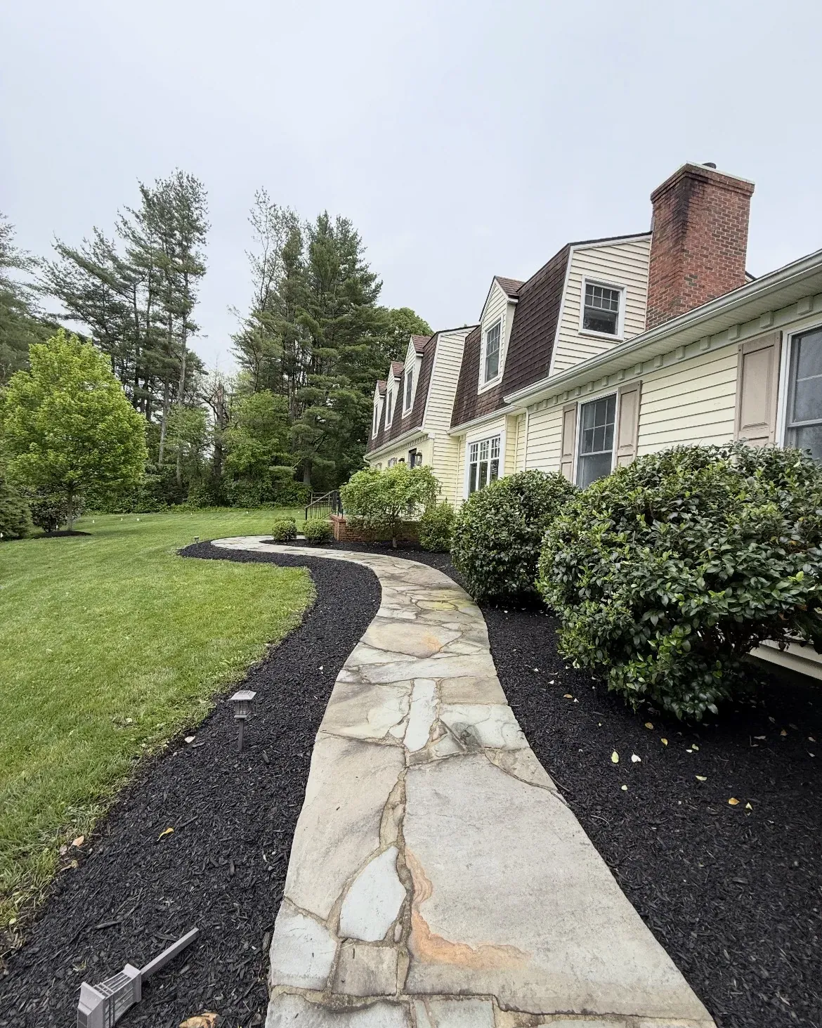 Flagstone walk with a cut mulch edge