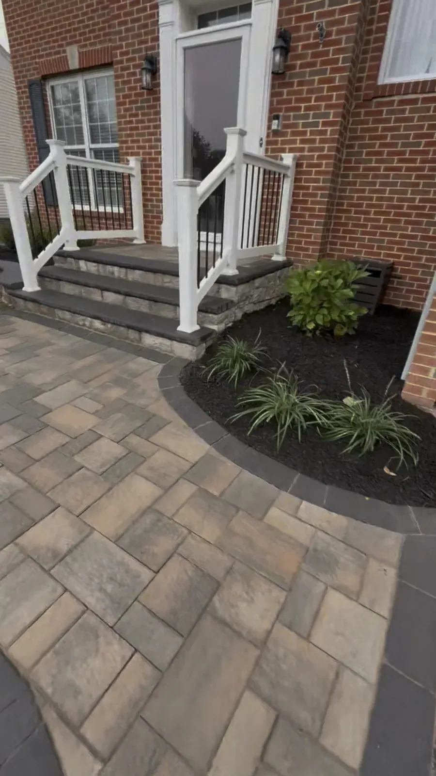 Paver walk with a contrasting soldier course