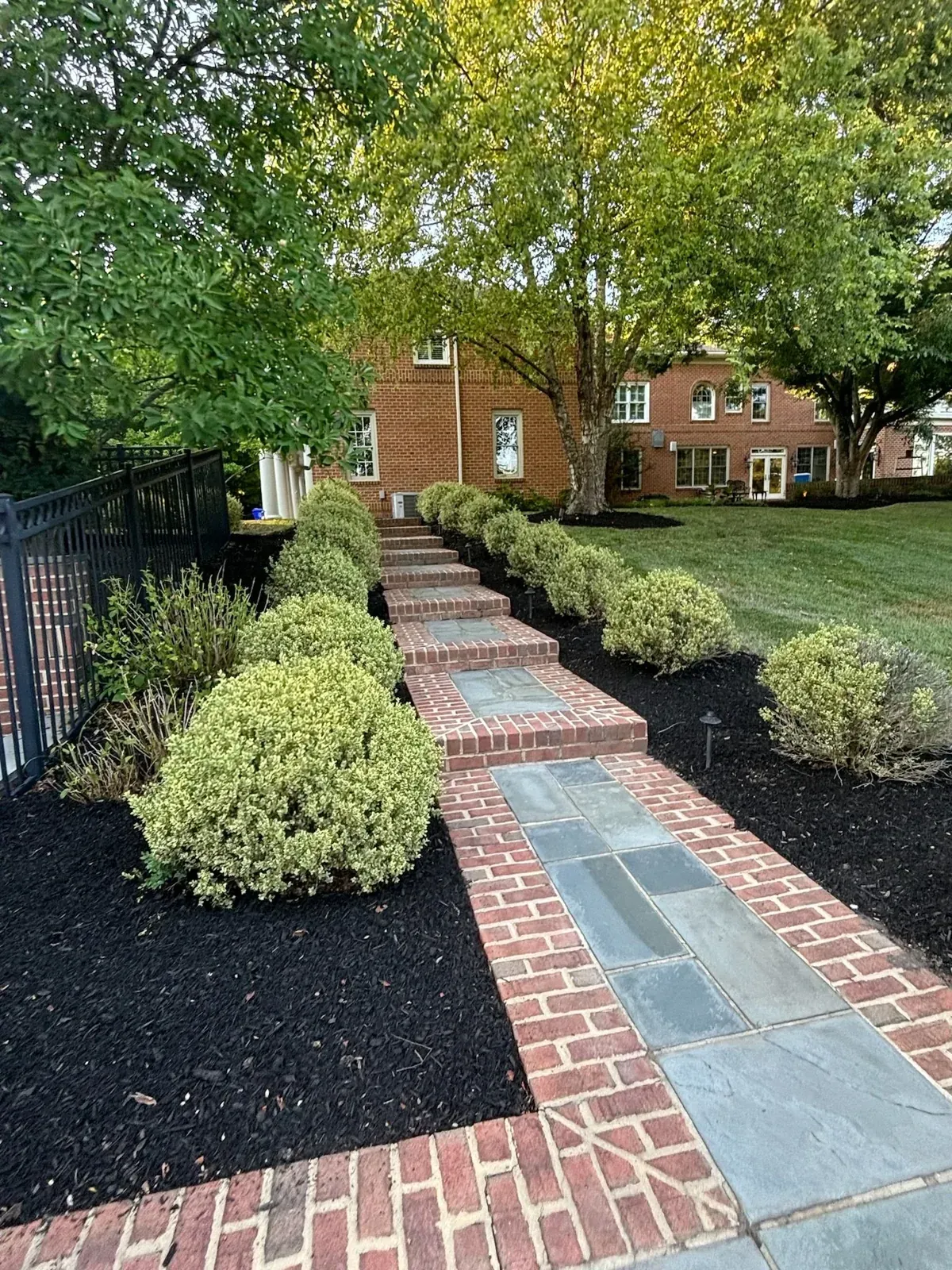Bluestone treads in a brick surround